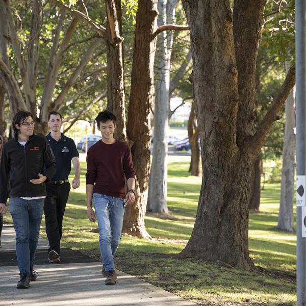 Graduates walking through campus at ANSTO, Lucas Heights