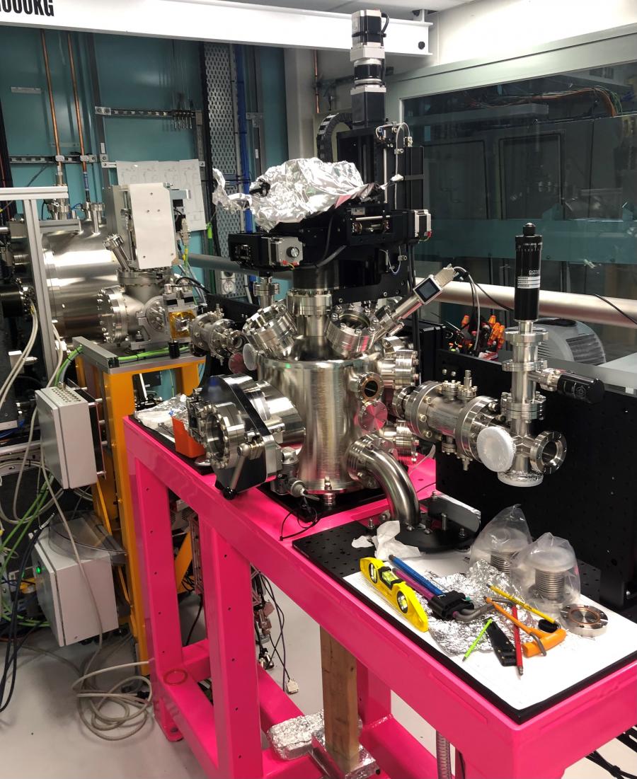 The MEX2 end station: stainless steel scientific equipment sitting on a bright pink stand