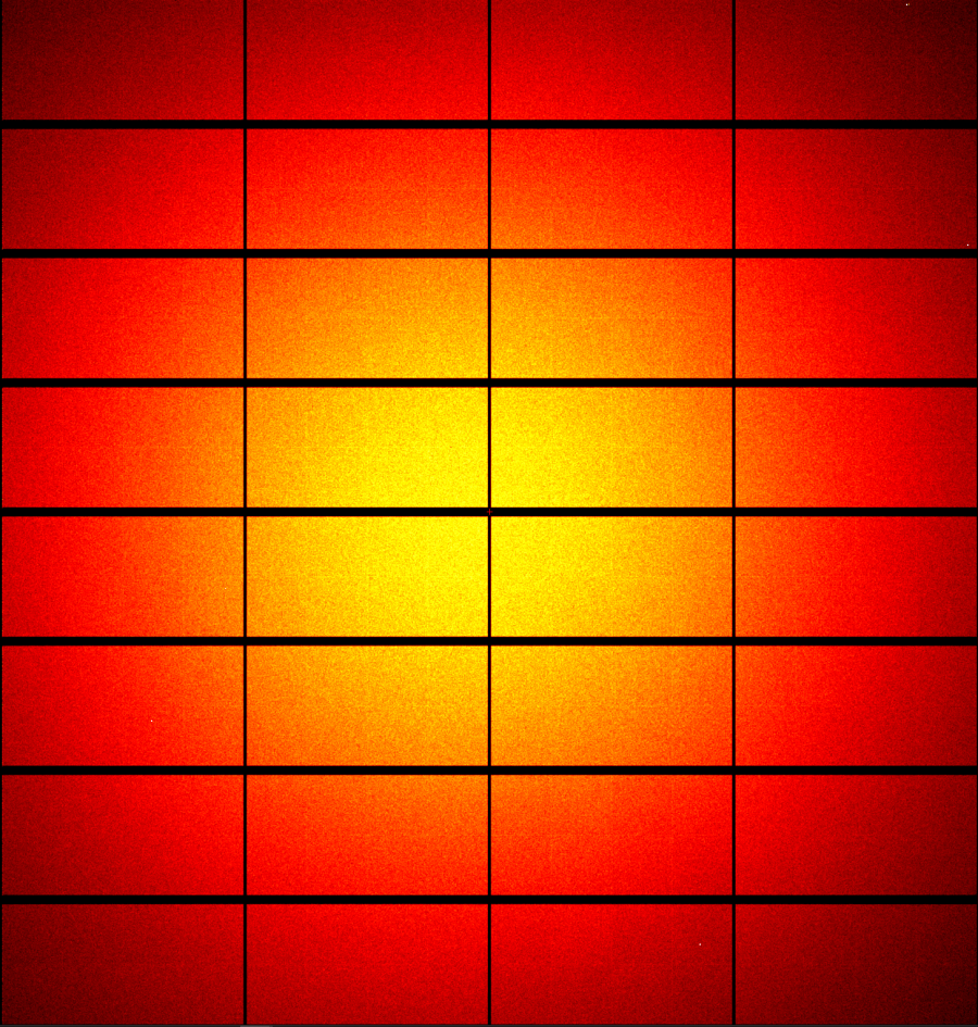 The first MX3 detector image, 32 rectangular modules with a glowing false-coloured sunset corona splashed across them