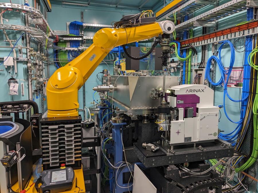 MX3's yellow robot installed in the hutch, in position to place a sample on the goniometer